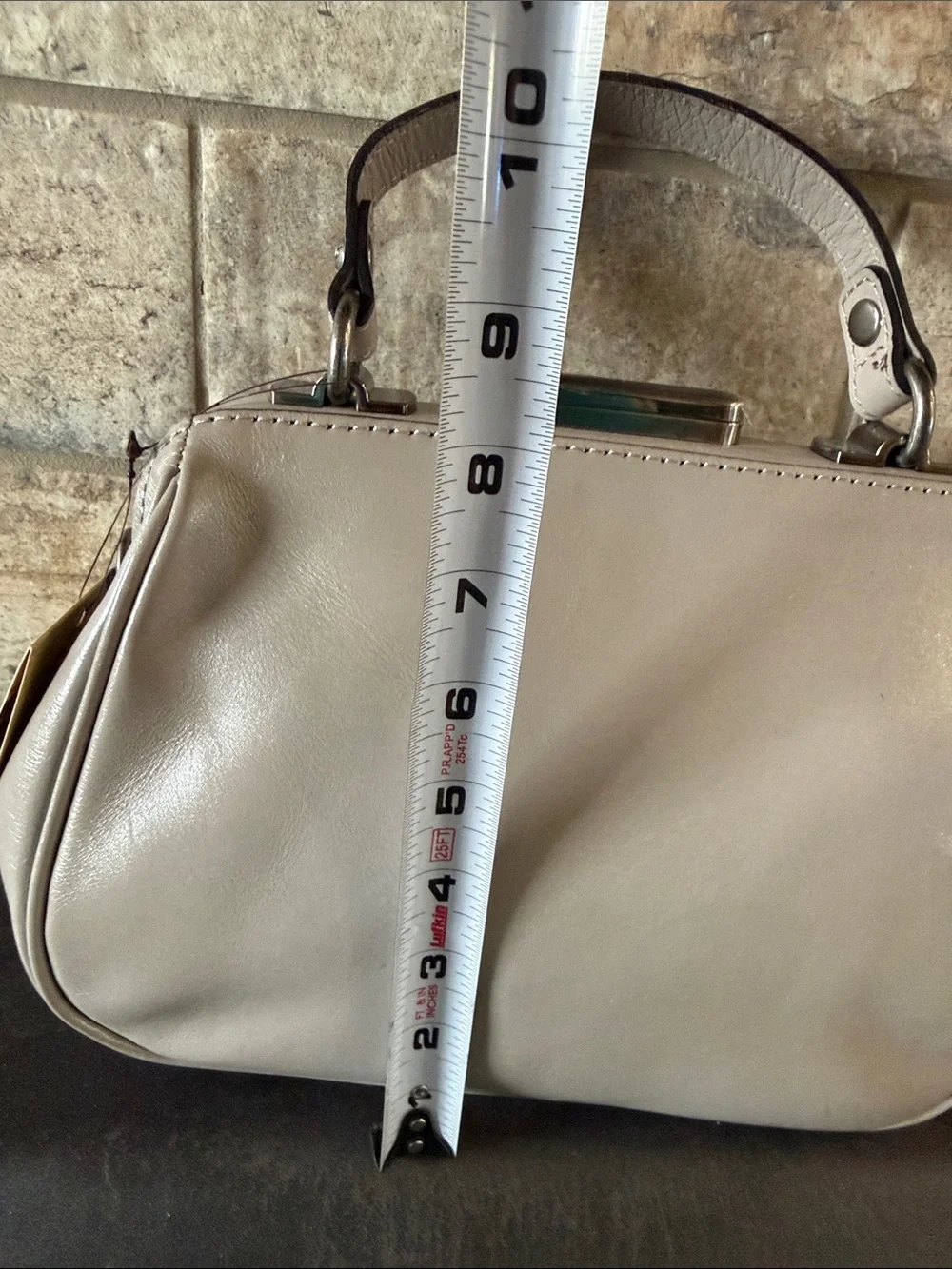 Patricia Nash Embossed Floral Frame Wristlet Bag in Taupe